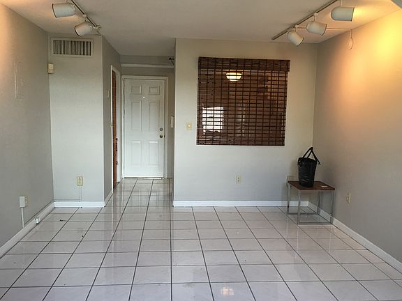 Dining area view to kitchen and entry