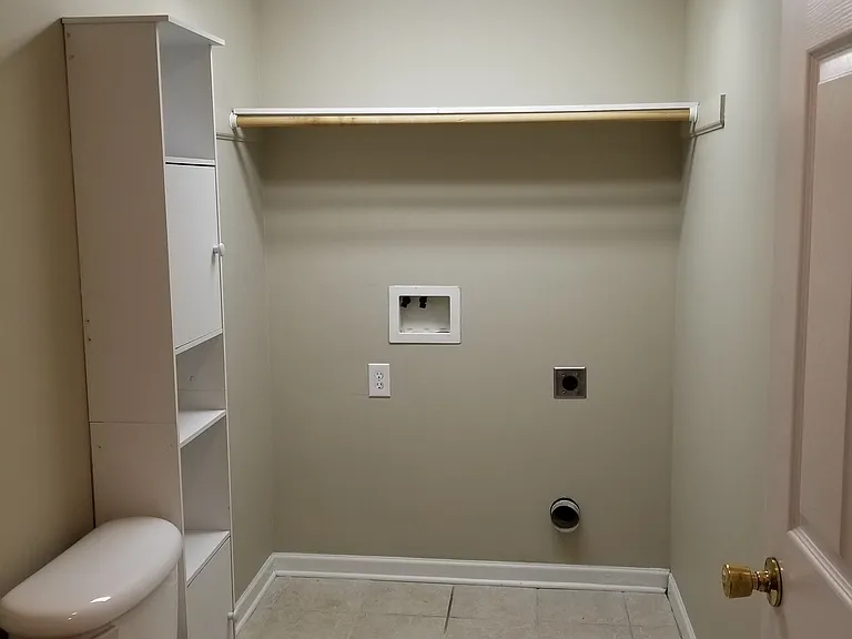 HALF BATH/LAUNDRY DOWNSTAIRS