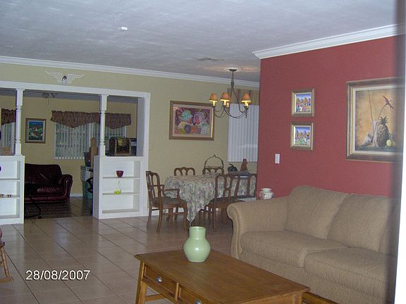 Liv room, entry to fam room,