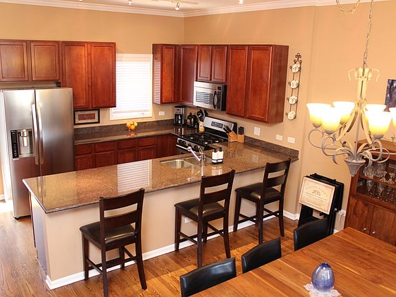 Kitchen showing dining area