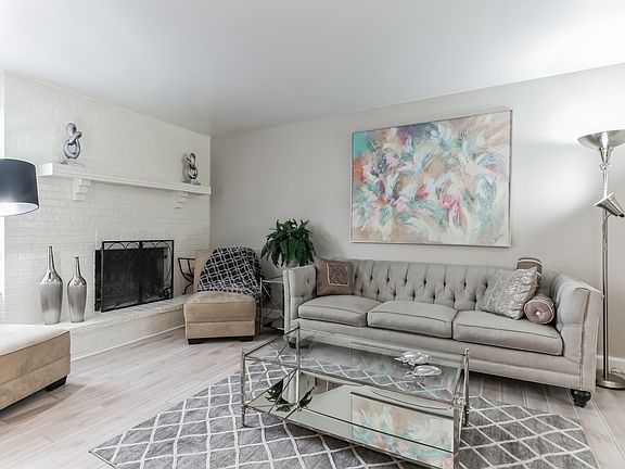 LIVING ROOM WITH FIRE PLACE, CONTEMPORARY FURNITURE LOTS OF LIGHT