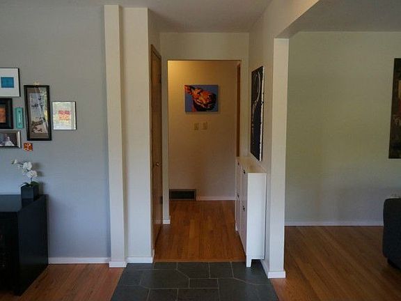 Hip Kitchen with NEW appliances. Door to backyard.