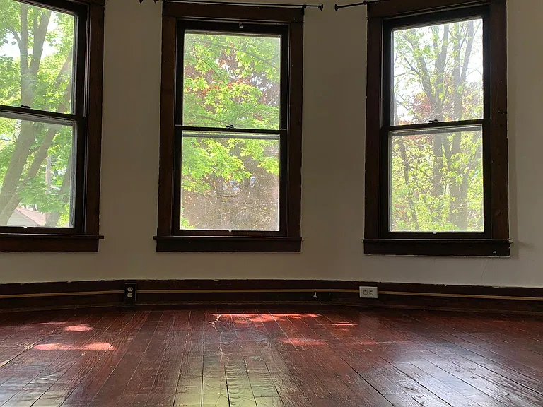 Large secondary bedroom with bay windows