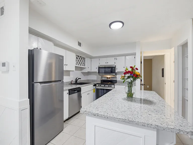 1802 E 66th Pl #F106 — Photo 4
