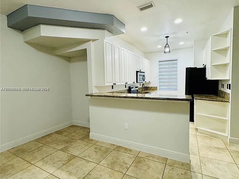 12430 SW 50th St #105 — Photo 11