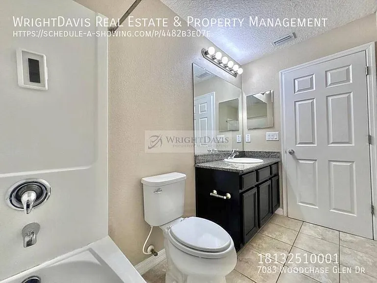 7083 Woodchase Glen Dr — Photo 23