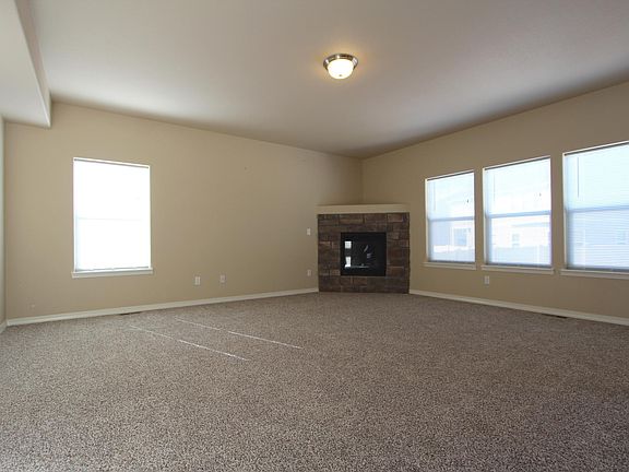 Living room/family room with gas fireplace.