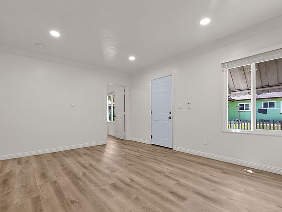 Living room, peeking into the second bedroom
