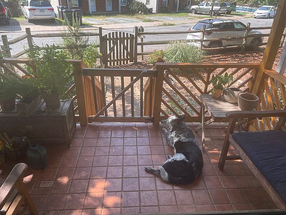 Covered front porch with tile.