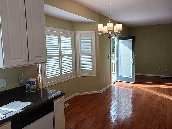 View from Kitchen into familly room with gas fireplace.