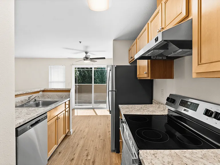 Enjoy a bright, open-concept kitchen with updated appliances and easy access to your living space. Enjoy a bright, open-concept kitchen with updated appliances and easy access to your living space.