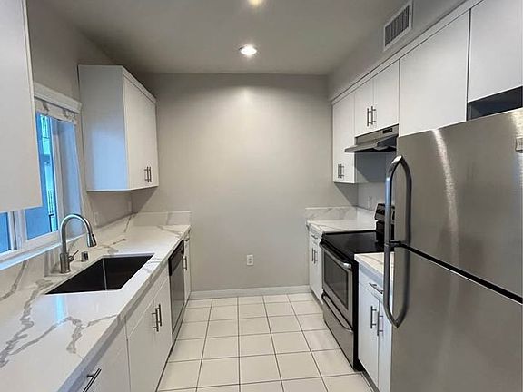 2nd image of 5100 Woodman Ave #209
