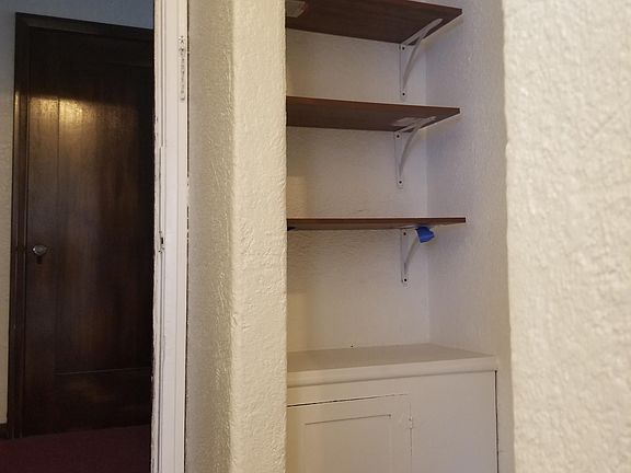 BUILT IN NOOK AS YOU WALK IN