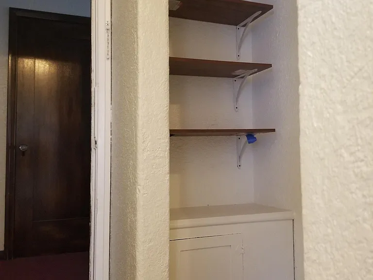 BUILT IN NOOK AS YOU WALK IN
