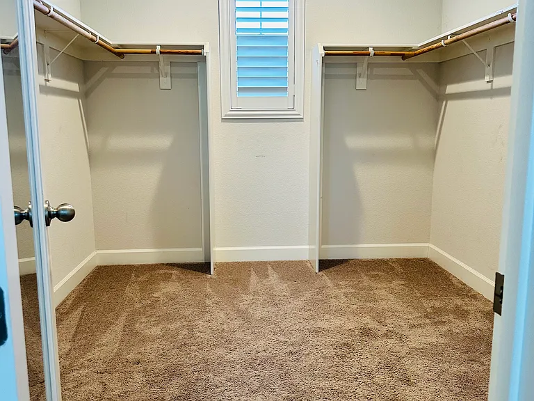Master Closet (recently upgraded to hardwood floor) This is old pic with carpet