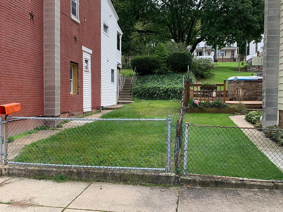 Side yard and a huge backyard are common ground