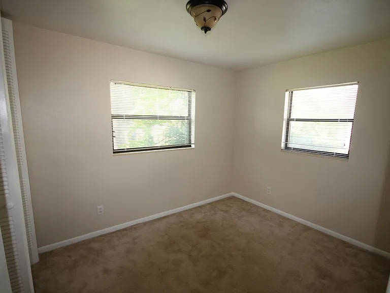 Bedroom, LVT tile not carpet now. Pics pending. Ceiling fan also included.