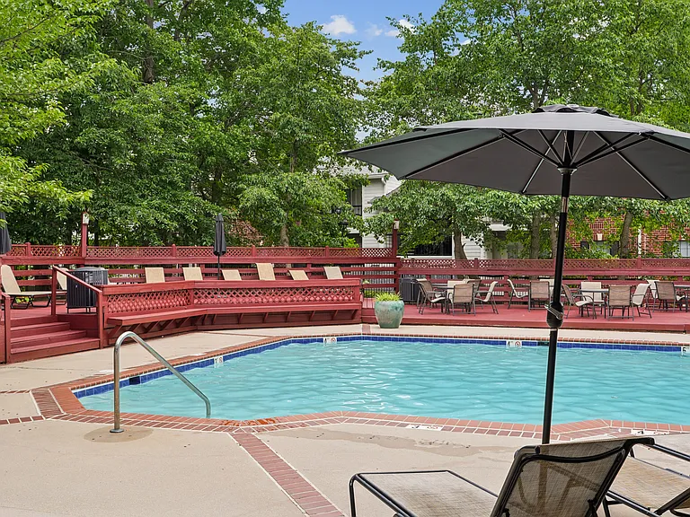 Pool & Sundeck with Outdoor Seating and Lounge Chairs