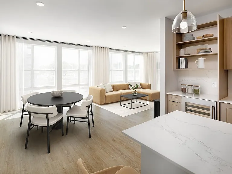 Signature Collection Dining and living areas with hard-surface vinyl plank flooring
