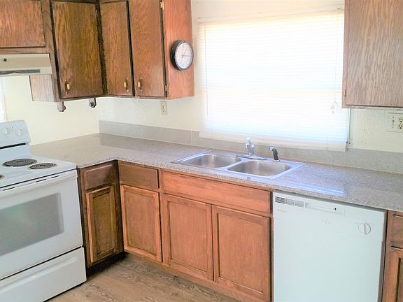 Brand new dishwasher and countertops in this open kitchen