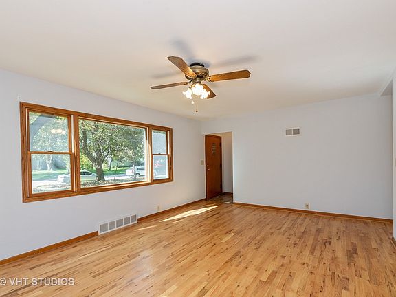 This shows the entry door and the hall closet across from the door.