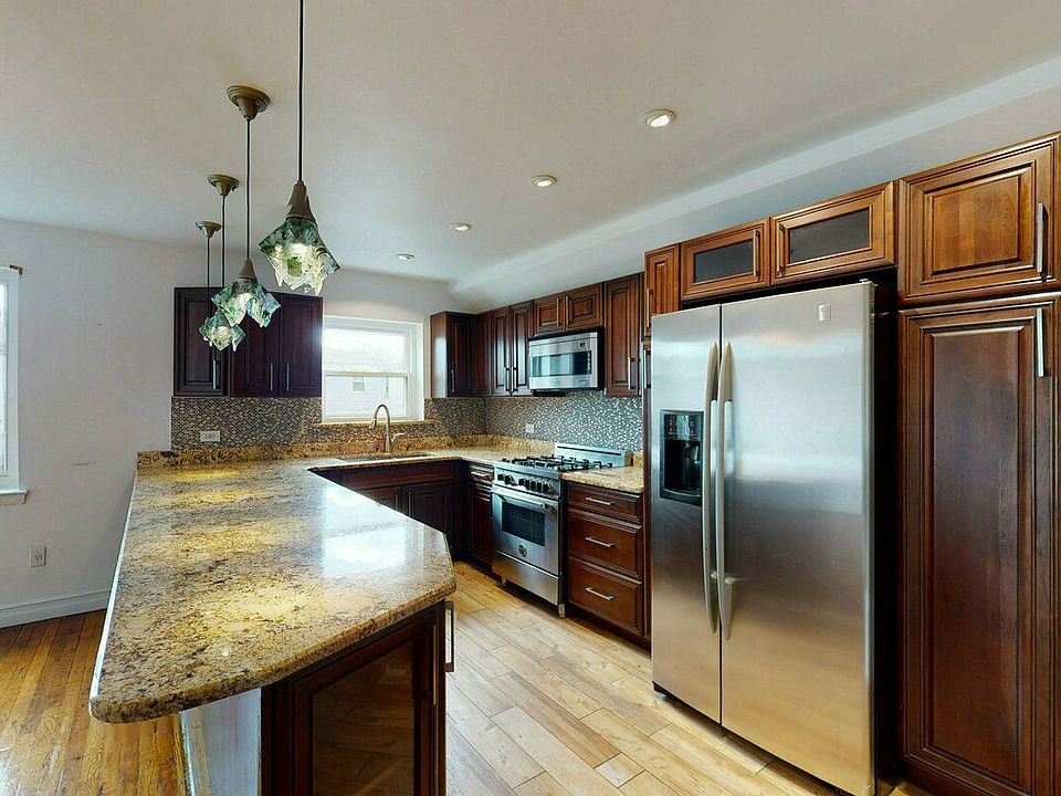 1st image of 1652 E 93rd St Floor 2