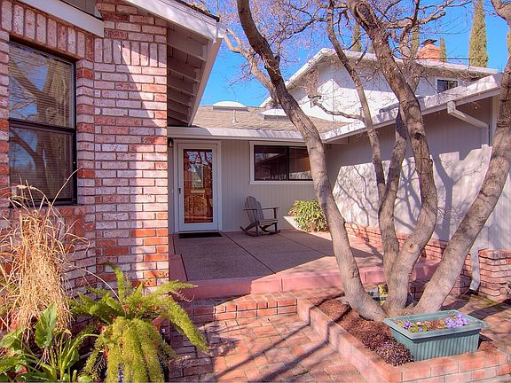 Inviting and Warm Front Entry and Patio