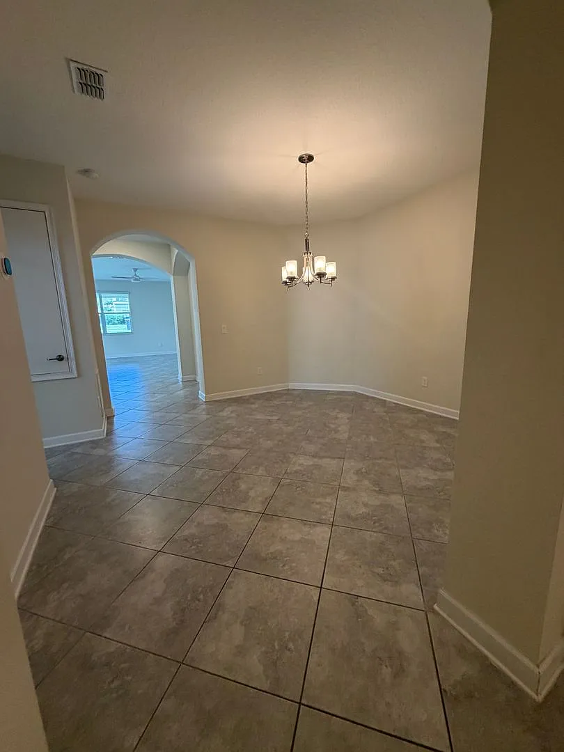 **Welcome Home to Signature Lakes in The Horizons West** — Photo 3