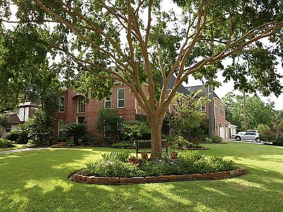 View of home from corner.  Great curb appeal.  Home of the Month Quality.  Side entry 3-car garage to the right of picture.