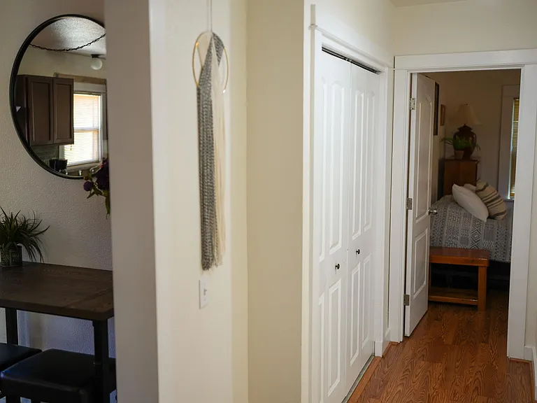 Hallway between bedrooms #2 and #3. In this hallway there is access to the bathroom and the closet where the washer and dryer live.