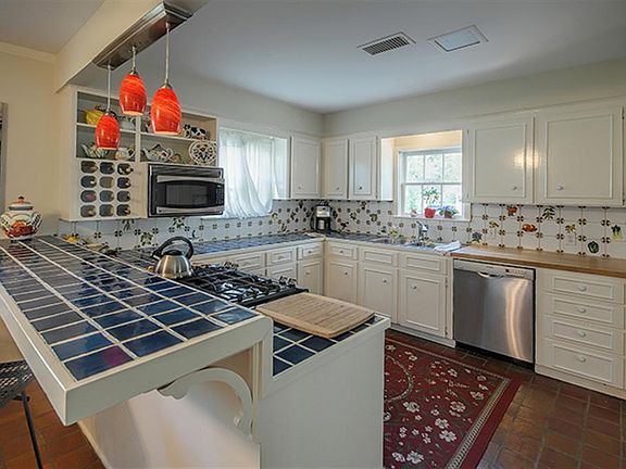 RECENT APPLIANCES i.e. FRIDGE, GAS STOVE AND DISHWASHER.