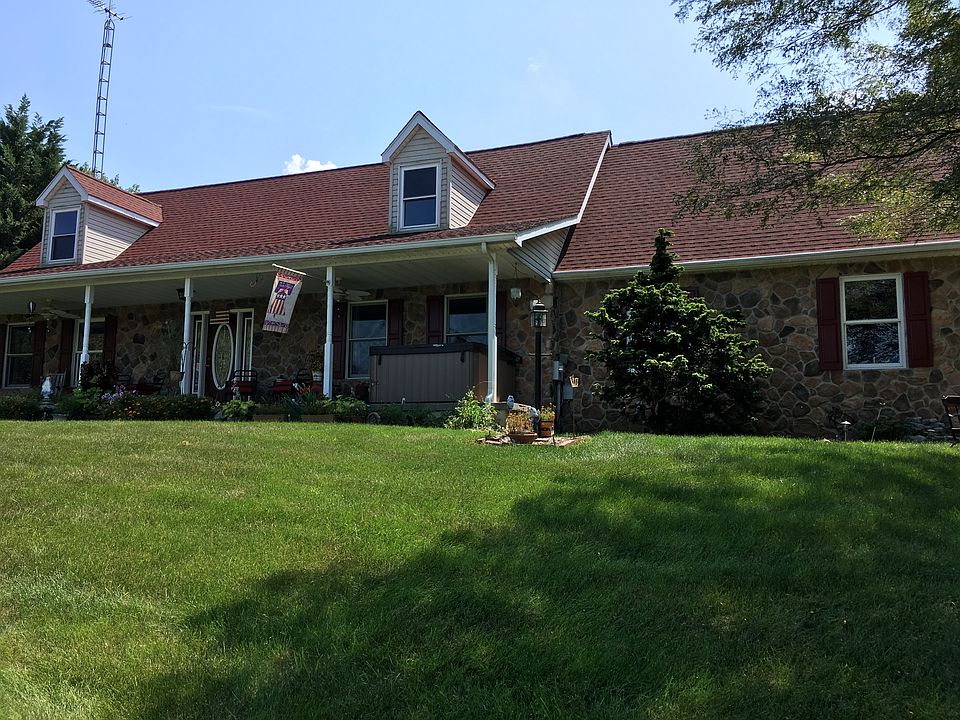Stone front and new red roof