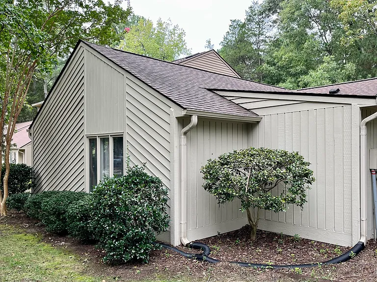 Side view exterior -- windows look in to the living room
