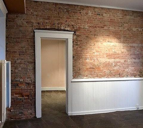 living room of Apt 1 looking into bedroom - Apt 2 is similar