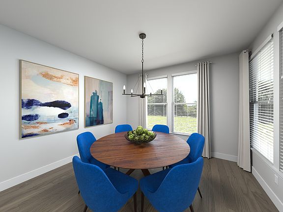 The open-concept floorplan allows for an easy flow between the kitchen and dining areas.