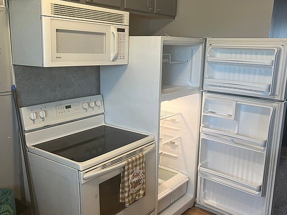 Stove, Microwave, & Refrigerator.