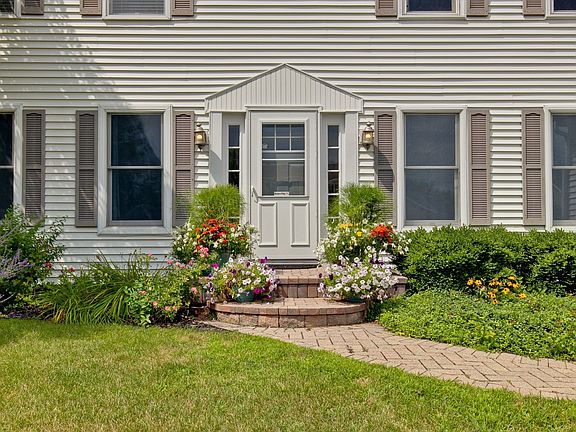Inviting front porch to decorate as you wish for every season or holiday.