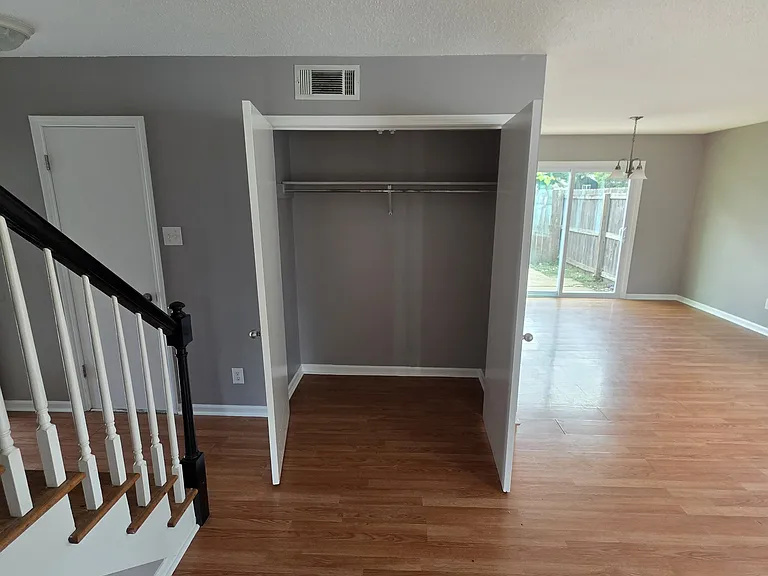 Coat/Storage closet off of living room.