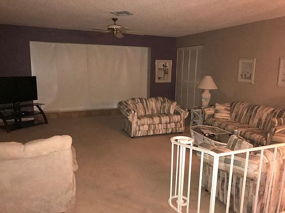 Stepdown family room with the privacy shades closed