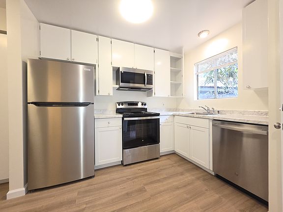 New Kitchen Appliances, Sink, Counter Tops, Lighting, Window Coverings, Flooring, etc.