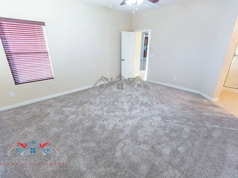 11751 W Daley Ln — Photo 32