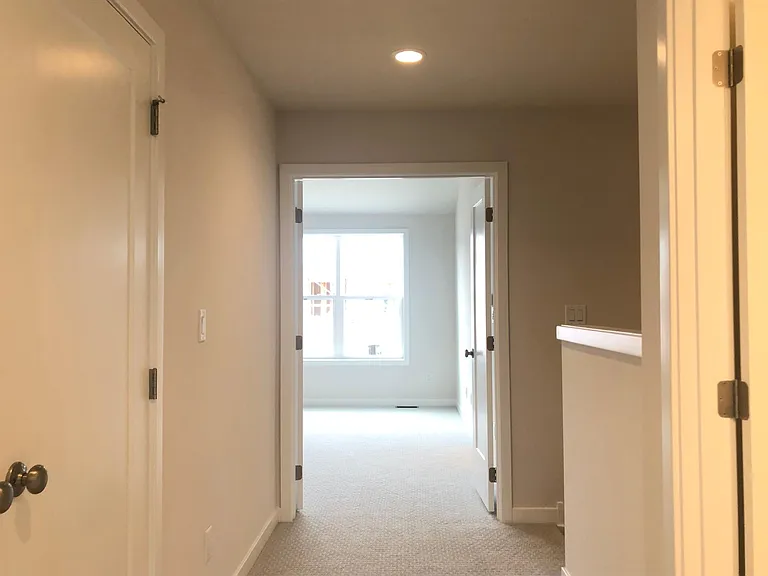 Bedroom level: hallway facing master bedroom.