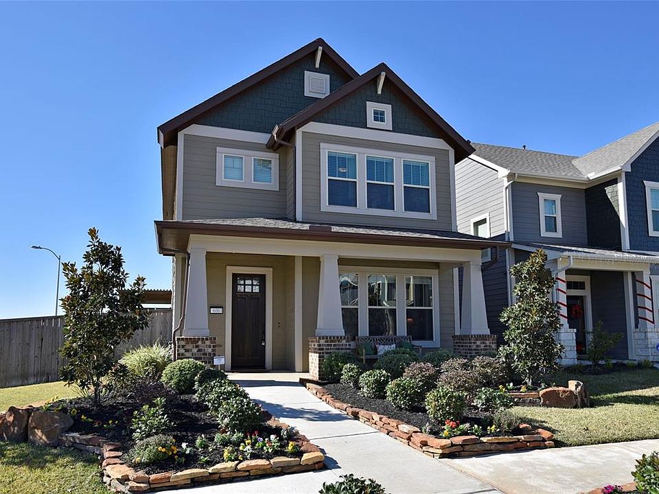 This former David Weekley model home is LOADED WITH EXTRAS AND UPGRADES. Corner lot has amazingly beautiful professional landscaping with rock lined flower beds and 2 magnolia trees that compliment this Craftsman style home.