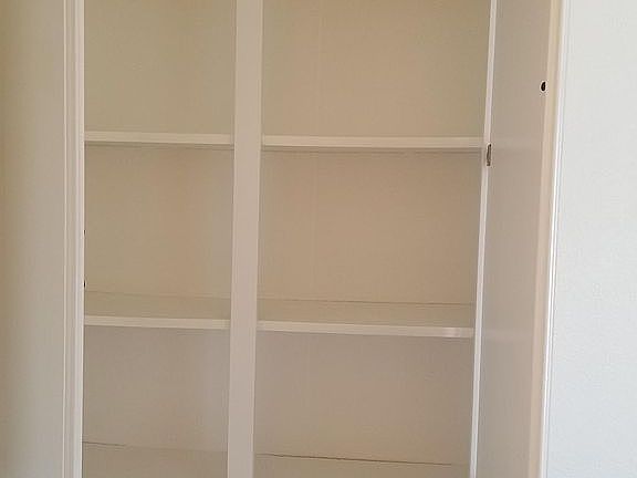 Upstairs linen closet storage