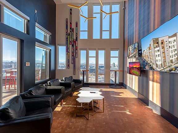 Rooftop deck with plush seating areas, great views, and outdoor TV