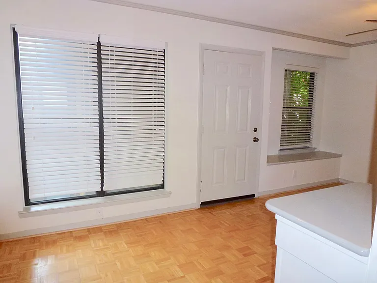 Cheerful living room, room for a table or desk.