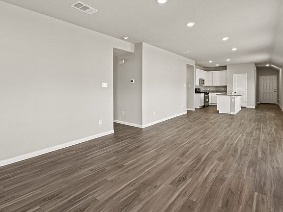 Family Room to Kitchen and Dining Area