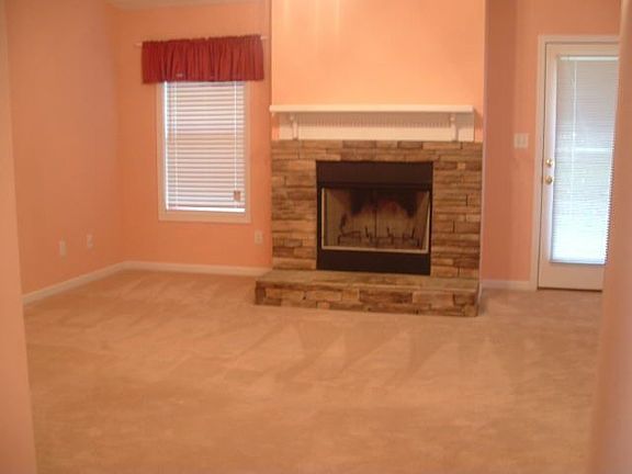 Living room--with wood burning fireplace