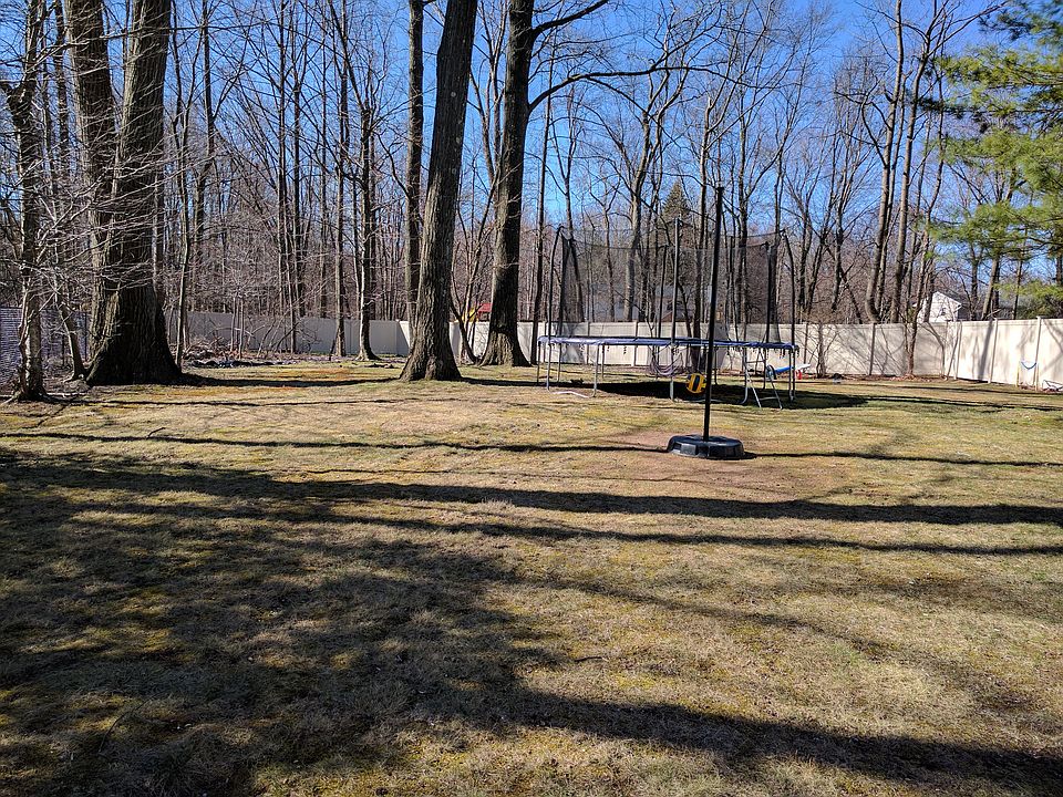 Play area with trampoline
