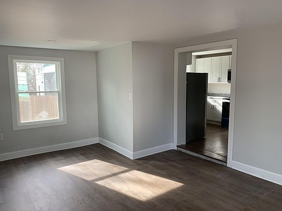 Living room leads to kitchen